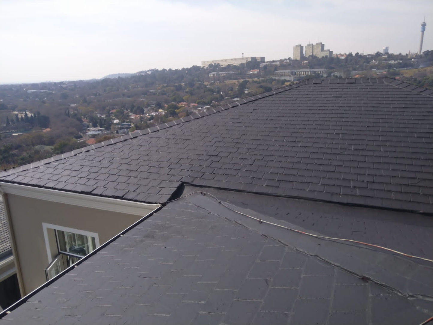 AsbestoFlex – Flexible Acrylic Coating for Asbestos Roofs