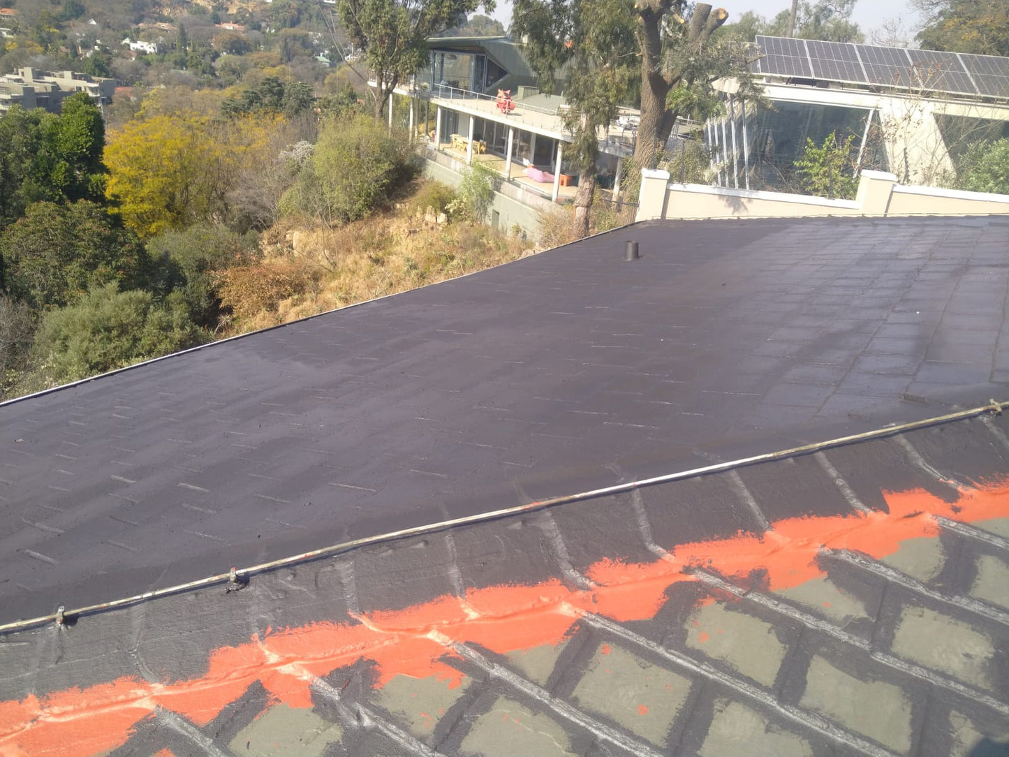 AsbestoFlex – Flexible Acrylic Coating for Asbestos Roofs